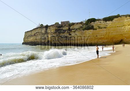 Senhora Da Rocha Beach,, Algarve, Portugal - October 02, 2014 : Tourists Enjoying The August Sunshin