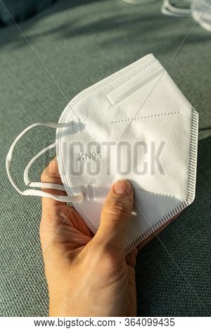 Woman Holding Kn-95 Protection Medical Mask. Prevention Of The Spread Of Virus And Epidemic, Protect