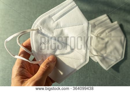 Woman Holding Kn-95 Protection Medical Mask. Prevention Of The Spread Of Virus And Epidemic, Protect