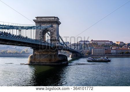 Budapest / Hungary - October 20, 2018: Beautiful Old Szechenyi Chain Bridge On The Danube River, Fam
