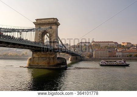Budapest / Hungary - October 20, 2018: Beautiful Old Szechenyi Chain Bridge On The Danube River, Fam