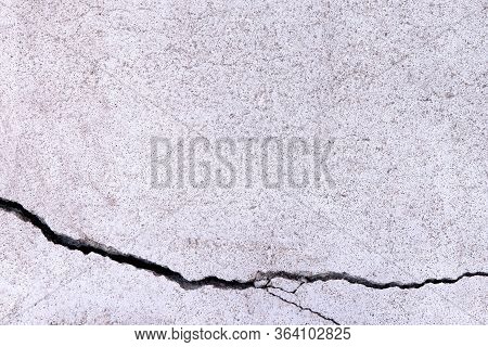 Crack On A Concrete Wall. Craked Cement Wall