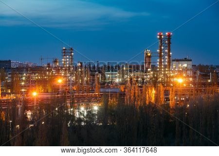 Chemical Factory At Summer Night. Rectification Towers