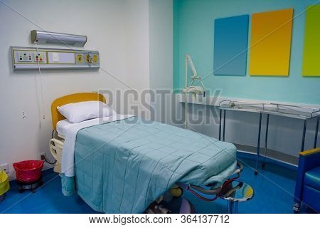Clean Empty Hospital Room Ready For One Patient.