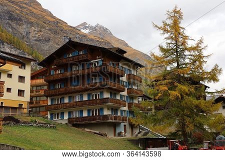Zermatt, Switzerland-october 21, 2019:the Old Building On Zermatt Bahnhofstrasse Street In Autumn An