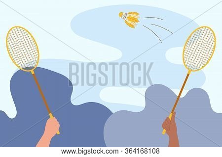 Concept Badminton Game With Shuttlecock. Rackets In Hands Of Players. Sports Games, Leisure, Fitness