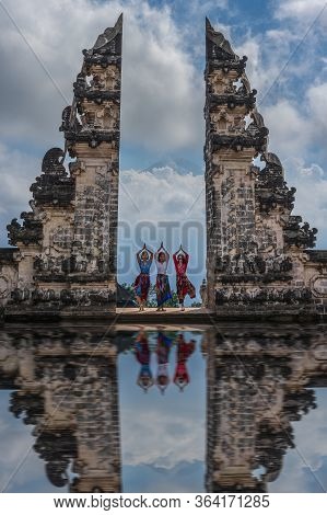 Lempuyang Temple, Mount Lempuyang, Karangasem, Bali, Indonesia - June 26, 2019 : Girls Making Yoga P