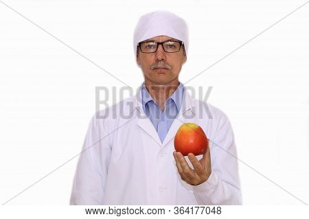 The Doctor Is Holding Vegetables And Fruits For Proper Wholesome Nutrition