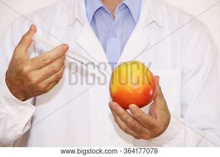 A Scientist Makes Genetically Modified Vegetables And Fruits.