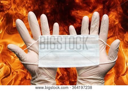 Nurse Hands Holding Respiratory Face Mask In White Medicine Gloves On Background Flames Of Strong Re