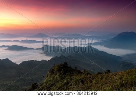 The Scenery Of Phu Chi Dao That Plenty Of Sea Of Mist And Twilight Sky Above Before Sunrise In Chian