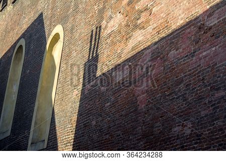 View Of The Red Brick Wall On Which The Shadow, Prague, Czech Republic