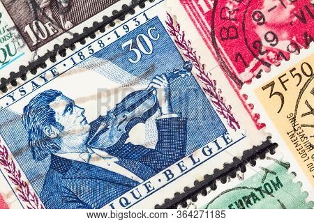 Seattle Washington - May 1, 2020: Background Of Stamps Of Belgium, One Featuring  Close Up Of Musici