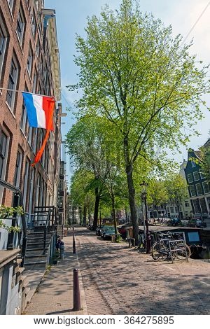Medieval facades at the Prinsengracht in Amsterdam Netherlands at Kingsday