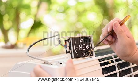 Repair And Fix Air Conditioner At Home. Lock Down And Self-quarantine At Home During The Corona Viru