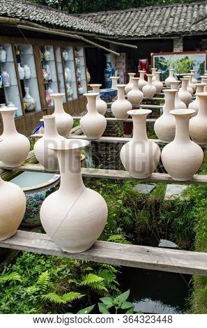 Clay Pottery Drying In Old Traditional Pottery Workshop In Jingdezhen, China