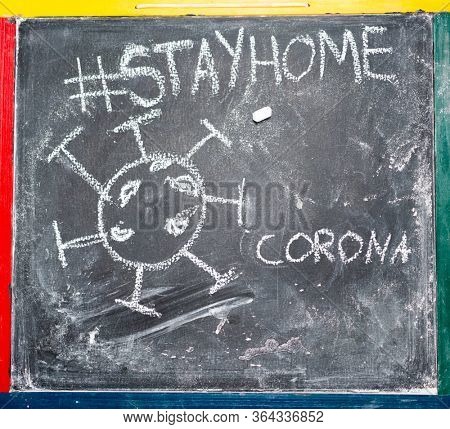 Corona virus sign on blacboard