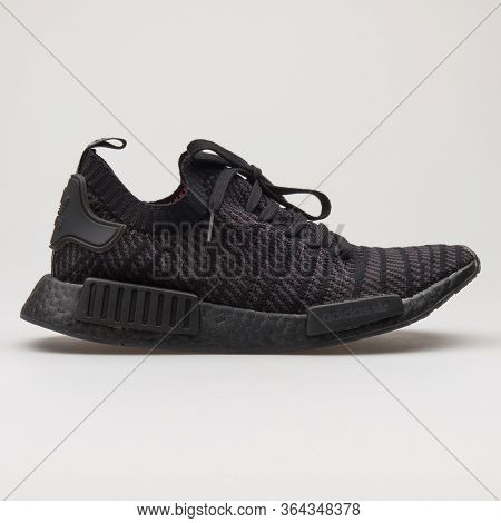 Vienna, Austria - February 19, 2018: Adidas Nmd R1 Stlt Pk Knit Black Sneaker On White Background.