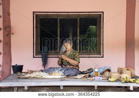 Thai Old Women Made And Working Bamboo Handmade For Show Traveler People At House In Life Community