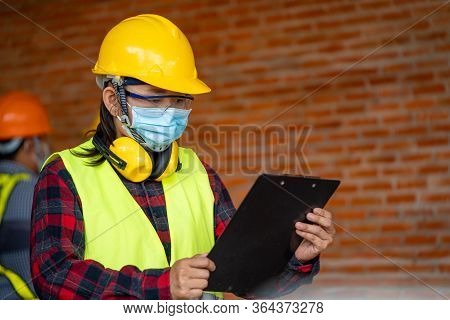 Engineer Women Wear Protective Face Masks For Safety At Construction Site,coronavirus Has Turned Int
