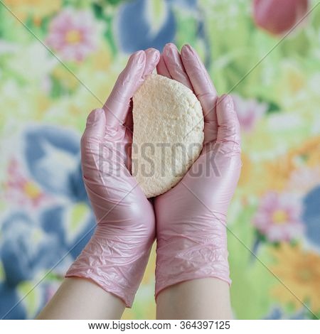 Freshly Made Homemade Cheese In Female Hands In Pink Nitrile Gloves.