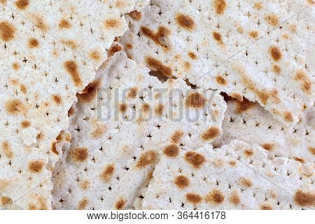 Matzah. Traditional Jewish Easter Bread. Passover Holiday Symbol. Broken Matzo, Lying In A Heap. Wit
