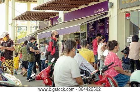 Bangkok, Thailand - May 02: Siam Commercial Bank Customers Queue Outside The Bank During Covid-19 Pa