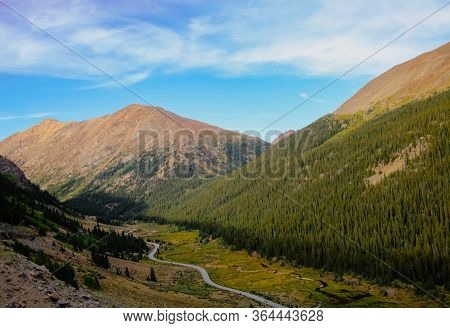 Beautifull Pine Trees And The Rocky Mountains Line The Narrow Winding Byway Of Independence Pass In 