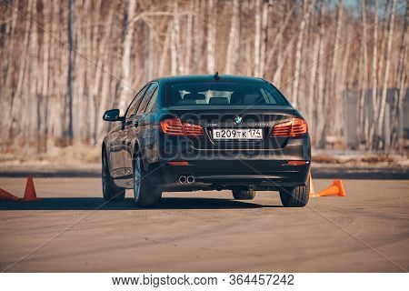 Bmw Advertising, Moscow, 1.11.2018: Demonstration Of A Model Of A Black Car, Cars On A Test Track, D