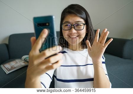 Stay At Home (social Distancing) Beautiful Woman With A Smartphone Fun And Smiling Social Media Type
