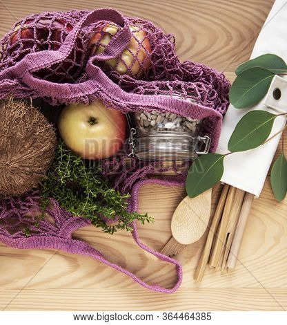 Net Bag With Reusable  Glass Jars, Fruits And Bamboo Cutlery. Zero Waste Concept. Eco Friendly. Flat