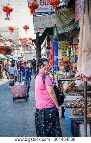 Samut Sakorn, Thailand - February 15, 2020 : Unidentified Asian Woman Shopping At Mahachai Market Is