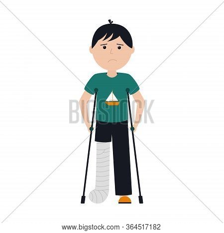 A Sad Boy In A T-shirt And Pants Stands With A Broken Leg On Crutches. The Leg Fracture Was Fixed Wi