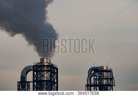 Air Pollution From Factory. Black Smoke From Chimney Of Industrial Pipe. Global Warming Problem Conc
