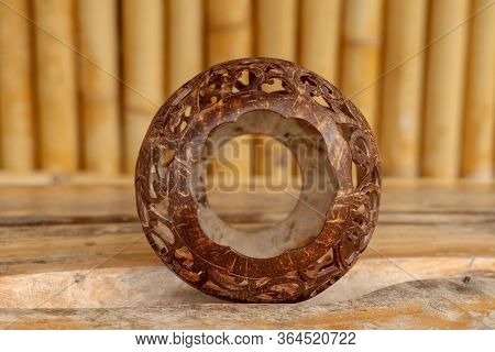 Coconut Shell Carving. Handicraft Of Indigenous People In Bali, Indonesia. Shelve With Balinese Souv