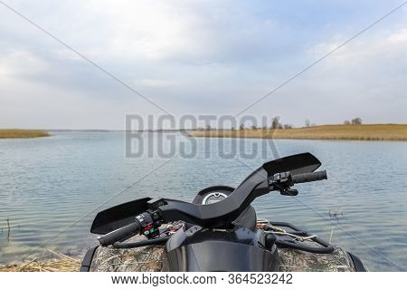 Atv Awd Quadbike Motorcycle Pov View Near Lake Or River Pond Coast With Beautiful Nature Landscape S
