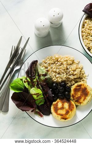 A Simple Vegan Lunch Or Dinner For A Family Of Two Adults And A Child. Brown Rice With Soy Okara And