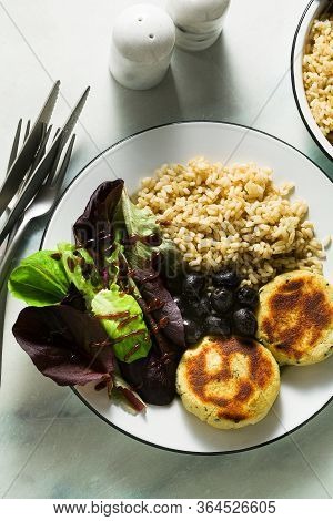 A Simple Vegan Lunch Or Dinner For A Family Of Two Adults And A Child. Brown Rice With Soy Okara And