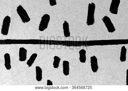 Horizontal Black Line And Brush Strokes Against A White Surface In Small Points