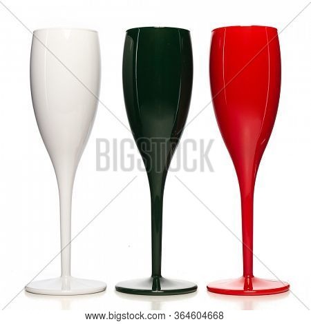 Realistic champagne glasses. Three mulricolored champagne glasses  for gourmets. Isolated glass cup on wite background for festive events 