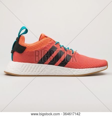 Vienna, Austria - February 19, 2018: Adidas Nmd R2 Summer Coral Sneaker On White Background.
