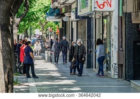 Thessaloniki, Greece - May 4 2020: Coronavirus Measures Affect Business & Daily Life. Greeks With Ma