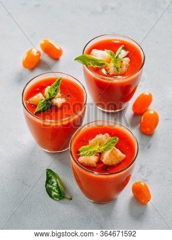 Delicious Gaspacho Soup In Glass. Traditional Spanish Cold Soup Puree Gaspacho Or Gazpacho On Gray C