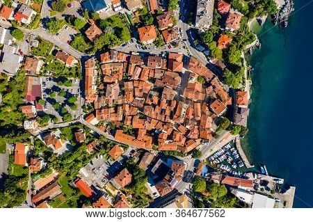 Croatia, Adriatic Coast, Beautiful Old Town Of Lovran. Historic Center And Coastline Aerial Overhead