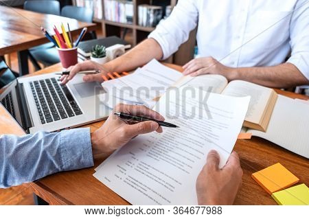 Teaching Helping And Study Course, Team Of Young Teacher Or Tutor Helps Students To Learning In Clas