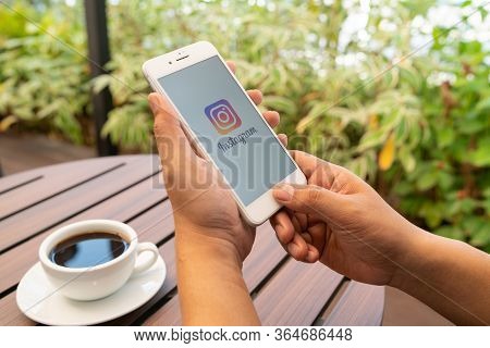 Chiang Mai, Thailand - Feb.15,2020: Man Holding Iphone With Instagram Application On The Screen. Ins