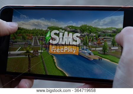 New York, Usa - 1 May 2020: Sims Freeplay App Logo Close-up On Phone Screen, Illustrative Editorial.