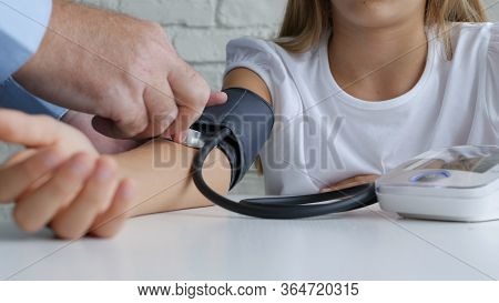 Tonometer Measuring Blood Pressure, Sick Child, Doctor Consulting Kids. People Medical Healthcare