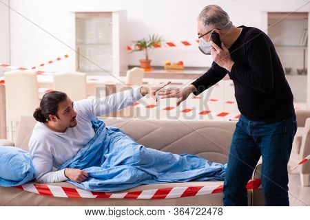 Father and son in coronavirus disease concept at home