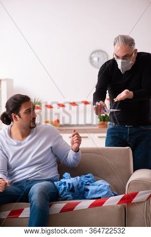 Father and son in coronavirus disease concept at home